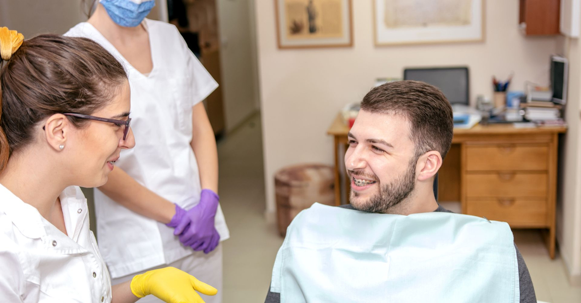 dentist talking to patient