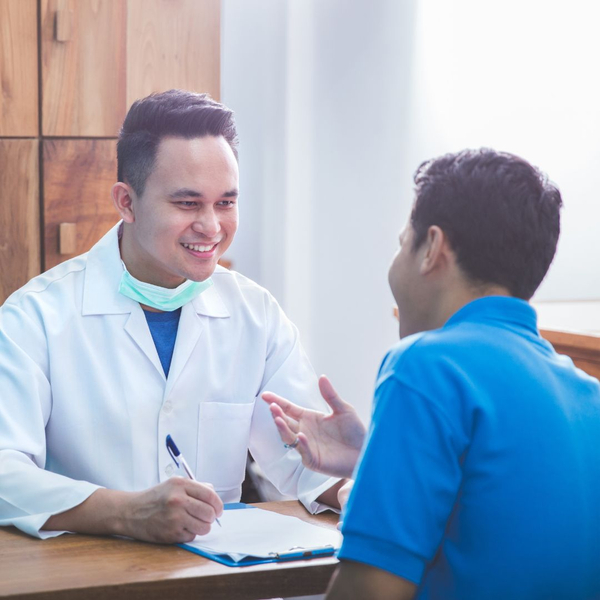 doctor talking to patient